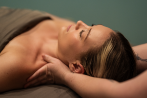 Client relaxed while receiving a specialty massage at Balance Spa